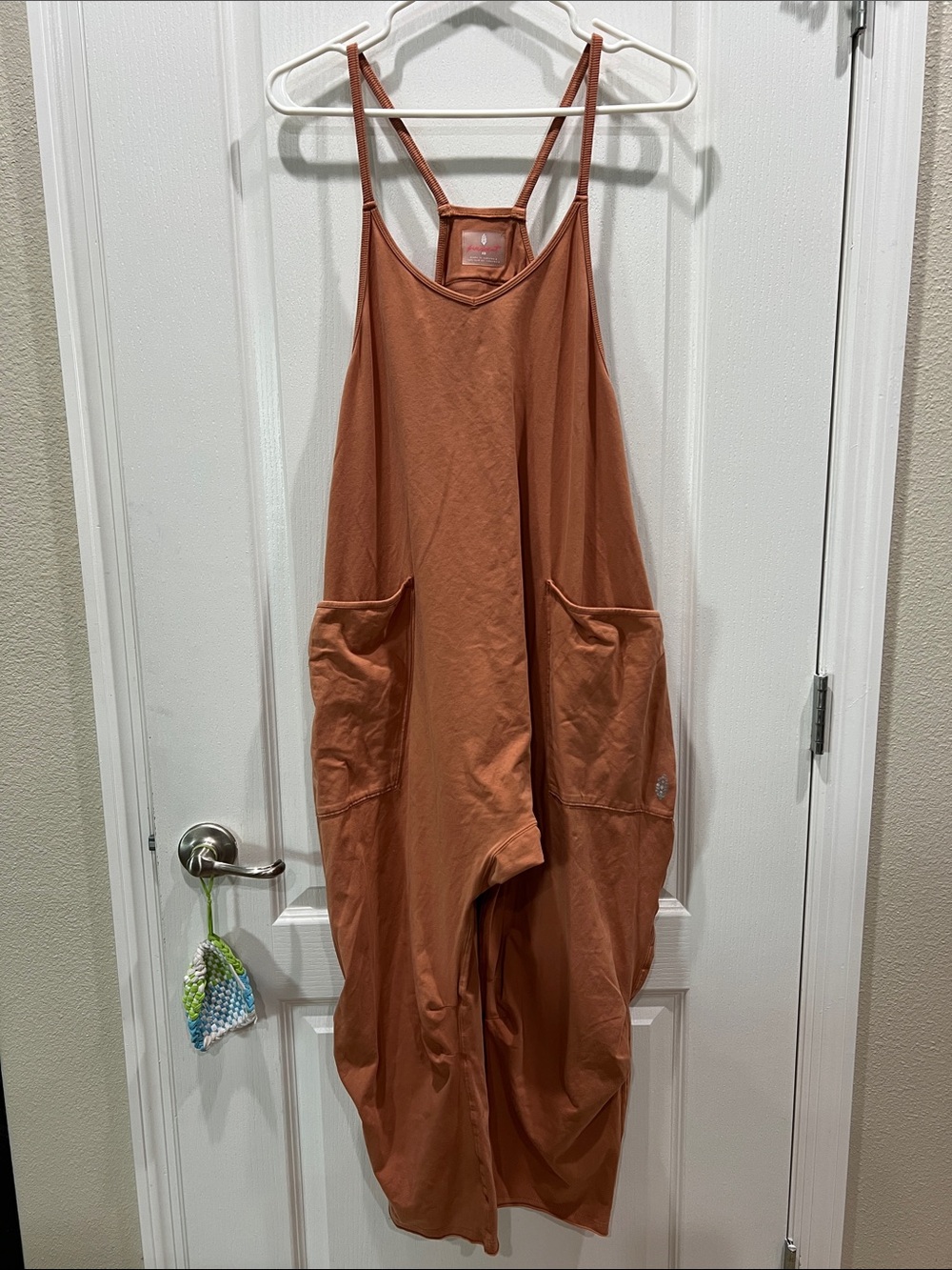 Free People Peach Orange Loose Jumpsuit with Front Pockets